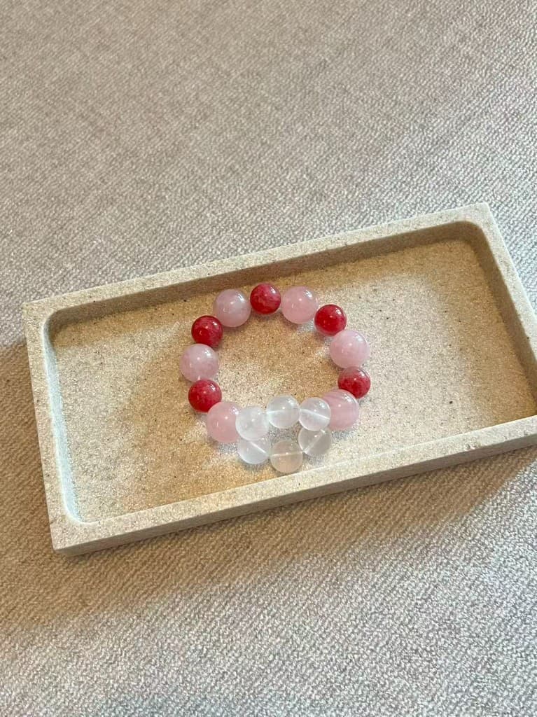 Rose and strawberry quartz mix on a stone tray